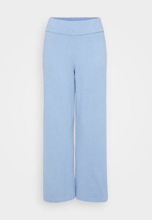 Light blue, wide-leg pants made of soft, textured fabric with a ribbed waistband. Smooth hem with no additional decoration or patterns.