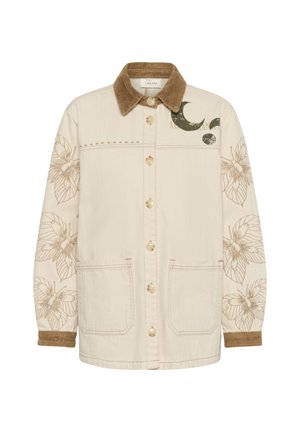 Veste crème à boutons avec col et poignets en velours côtelé marron, imprimés de papillons sur les manches et motif de croissant de lune vert sur la poitrine.