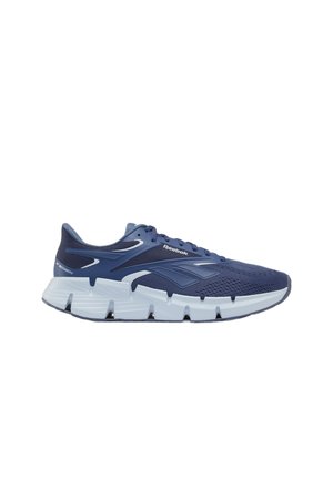 Zapatilla de running Reebok azul marino con parte superior de malla, diseño con cordones, suela blanca segmentada y logo de la marca en el lateral.