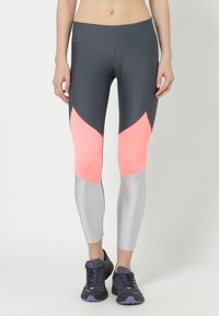 Leggings colorblock in grigio, rosa e argento. Presentano una vita elasticizzata e un materiale liscio e elasticizzato per comfort e mobilità.