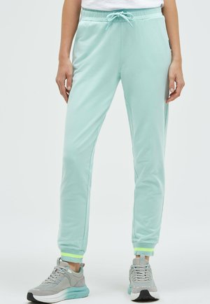 MIT BÜNDCHEN-DETAILS - Jogginghose - misty mint