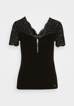Black short-sleeve top with a deep V-neck, lace shoulder detailing, a front zipper, and a fitted design. Smooth fabric with lace accents.