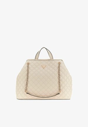 Sac à main matelassé beige avec double poignée supérieure et bandoulière chaîne dorée, ornée d'un petit logo métallique triangulaire sur le devant.