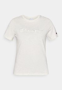 Άσπρο βαμβακερό μπλουζάκι με κοντά μανίκια, στρογγυλή λαιμόκοψη και κεντητό λογότυπο "Champion" με αντίθετη υφή στο μπροστινό μέρος.