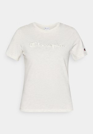 Hvit bomulls-t-skjorte med korte ermer, rund hals og brodert "Champion"-logo i en kontrasterende tekstur på forsiden.