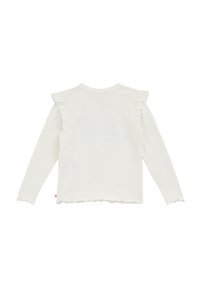 Witte langwerpige blouse met gerimpelde accenten op de schouders en een golvende onderrand. Zachte stof met een gladde textuur.