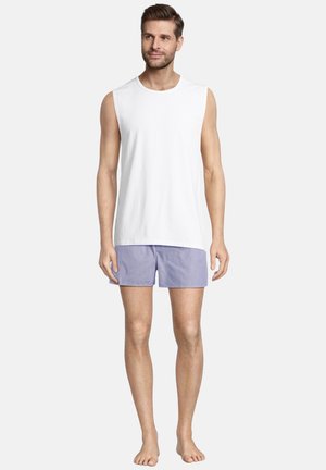 White sleeveless top and light purple striped shorts. The fabric appears smooth with a casual fit. No visible patterns or additional details.
