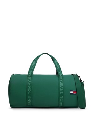 Borsa cilindrica verde con doppie maniglie e tracolla, con logo Tommy Jeans sulle cinghie e una piccola toppa con logo.