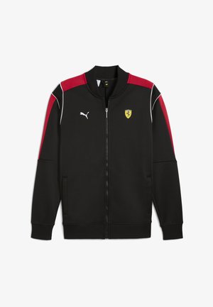 Black zip-up jacket with red accents, white stitching, and Puma logo; features Ferrari crest on the chest and two side pockets.
