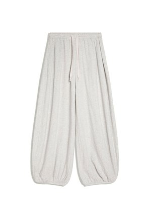 Pantalon ample gris clair avec taille élastique, cordon de serrage et poignets élastiques sur fond blanc.