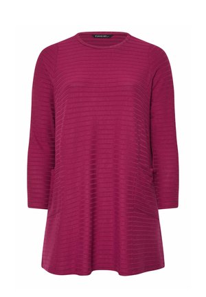 Langärmliges, strukturiertes Tunika-Oberteil in tiefem Magenta mit horizontalem Rippenmuster und Seitentaschen, rundem Ausschnitt und lockerer Passform.