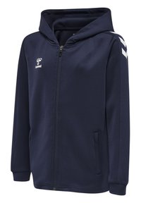 Felpa zip con cappuccio di colore blu navy realizzata in tessuto morbido, dotata di cappuccio, tasche laterali e dettagli a V bianchi sulle spalle.
