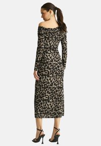 Leopard print, off-the-shoulder, long-sleeve dress in brown and black, fitted shape, mid-calf length, textured fabric.