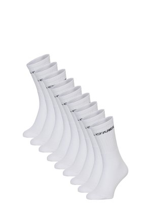 Pack van tien paar witte sokken met ribbelboorden en een zwart logo. Zachte, rekbare stof met een gladde textuur en een design tot de kuit.