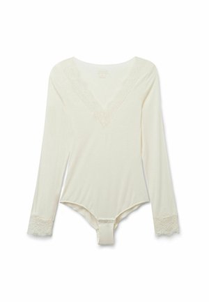 Långärmad gräddfärgad bodysuit i mjukt tyg, med V-ringning och spetsdetaljer, spetsakcenter vid ärmsluten samt tryckknappsstängning längst ner.