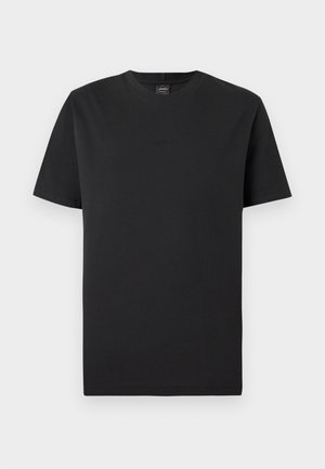 T-shirt noir à manches courtes en coton. Il possède un col rond et un logo embossé discret sur le devant. Texture lisse, coupe regular.