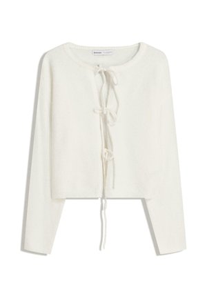 Pulover alb scurt cu mâneci lungi, cu decolteu rotund și închidere cu fundă în față. Textură moale și design minimalist.