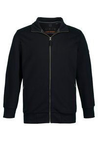 Chaqueta negra con cremallera hecha de tela suave, con cuello alto, bolsillos laterales y puños y dobladillo acanalados. Diseño simple y funcional.