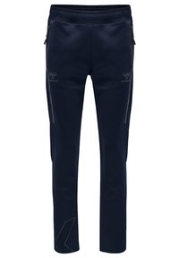 Marineblauwe sportbroek met een taps toelopend ontwerp, gemaakt van zachte stof, met ritszakken en een subtiel logo aan de voorkant.