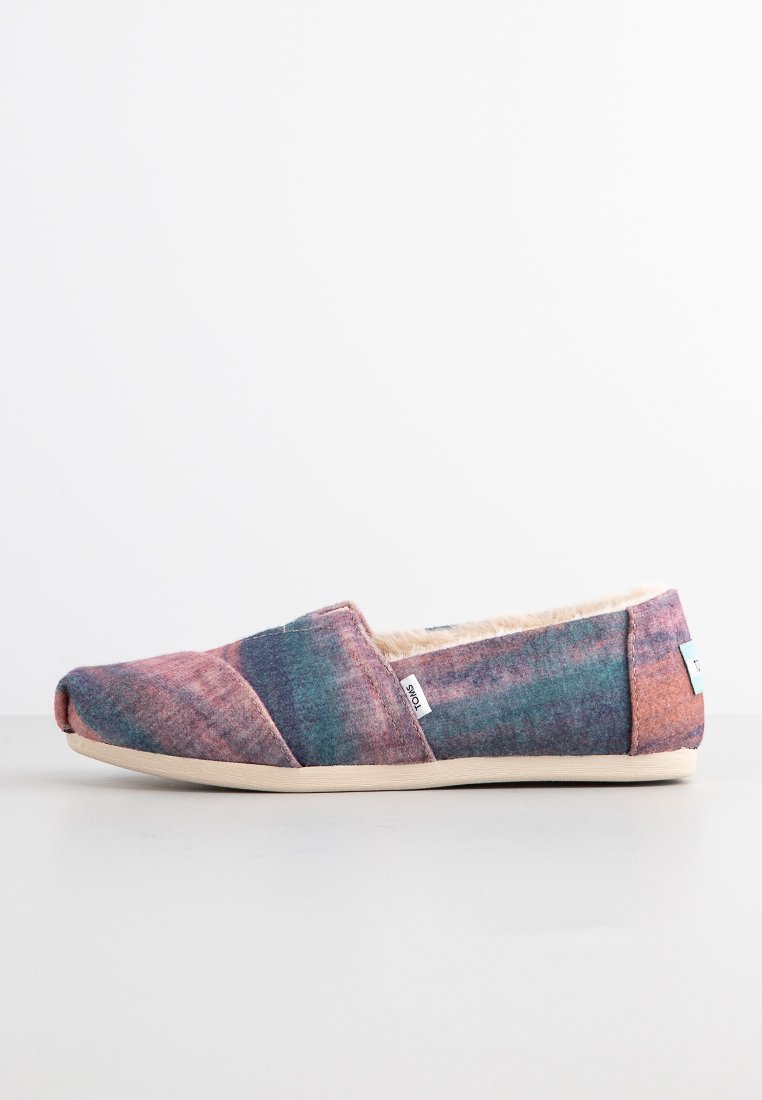 TOMS Pantoffels donkerroze TOMS Pantoffels donkerroze