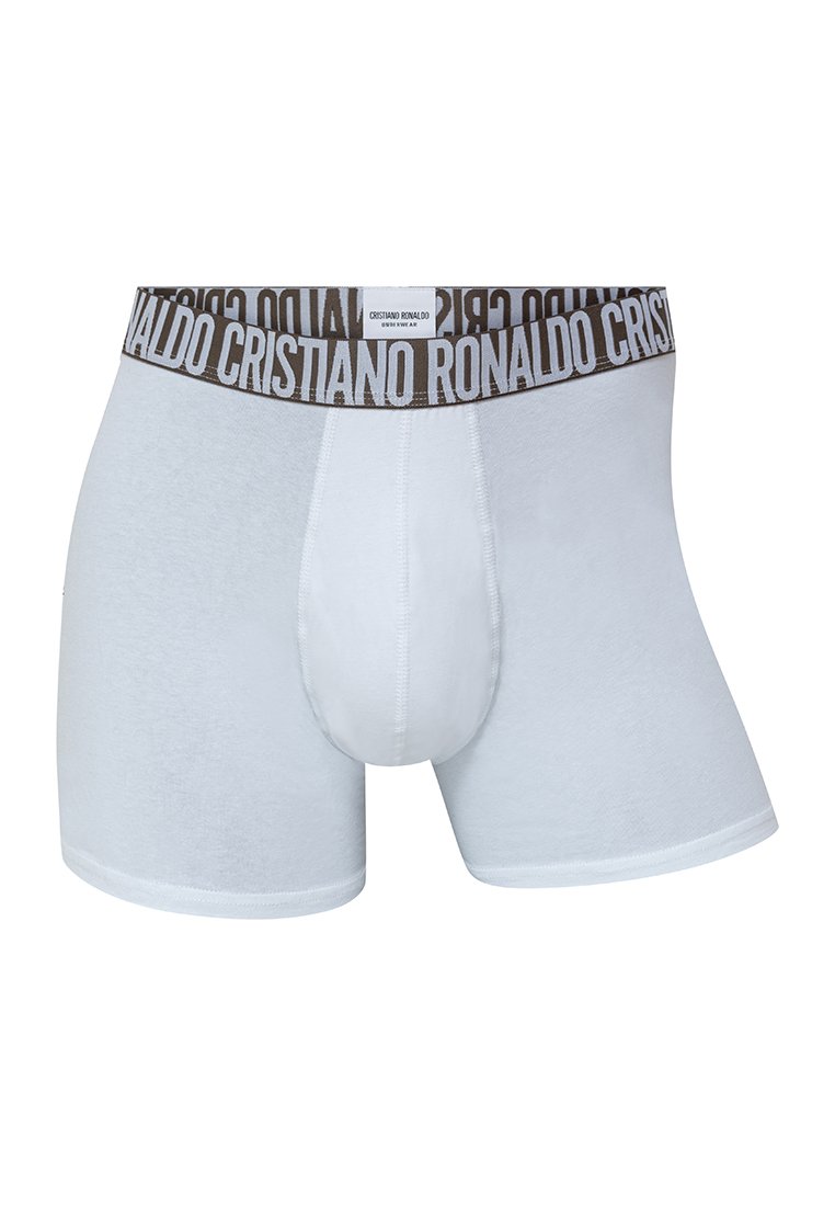 Boxers en coton blanc avec une ceinture élastique marron affichant "Cristiano Ronaldo" en texte répétitif. Présentent une texture lisse.