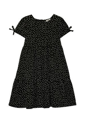 Vestito nero a maniche corte con pois bianchi, gonna a balze, scollo rotondo e piccoli fiocchi sulle maniche.