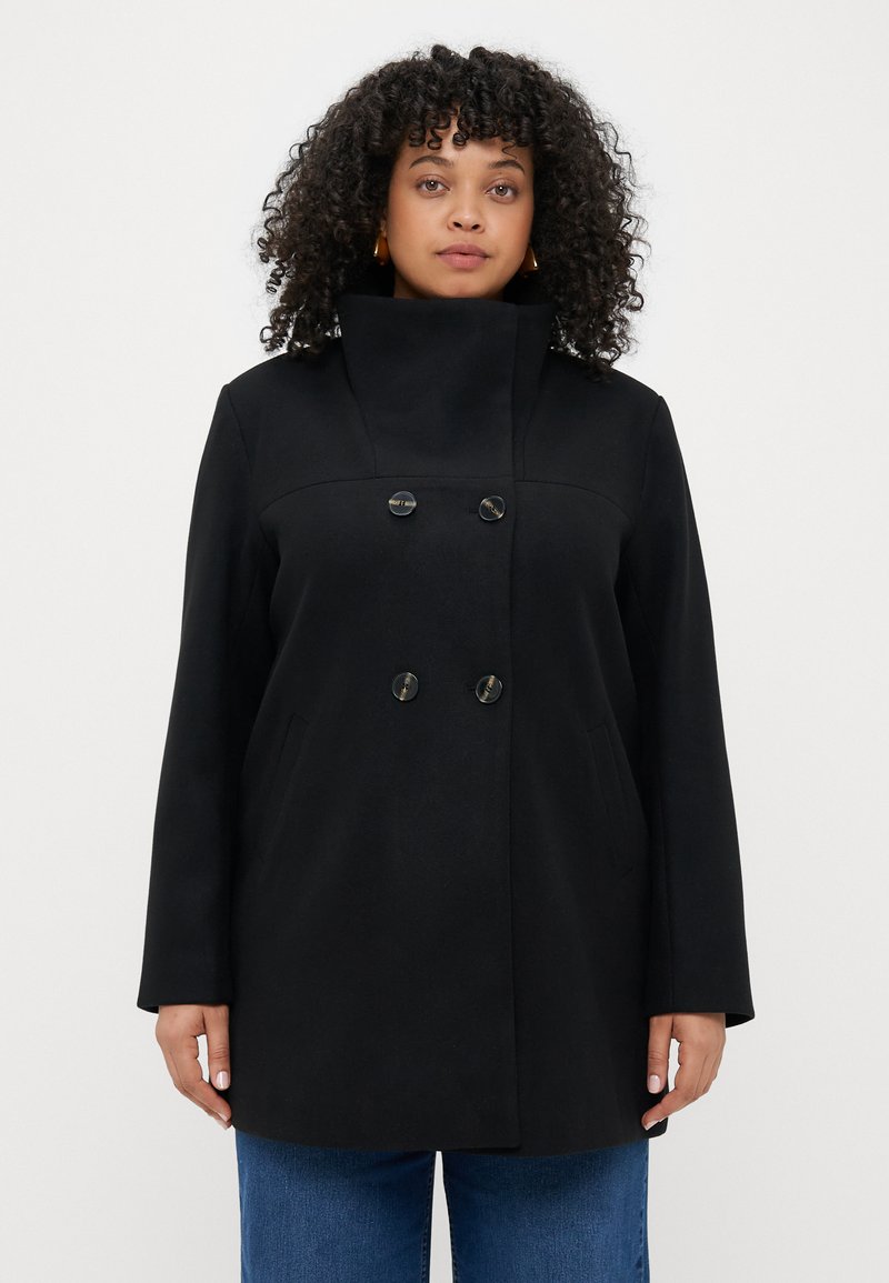 Cappotto in misto lana nero con colletto alto, design doppiopetto e grandi bottoni neri, dotato di tasche laterali e texture liscia.