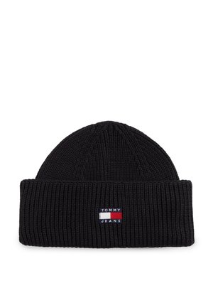 Black ribbed knit beanie with folded cuff featuring a small rectangular Tommy Jeans logo patch in navy, white, and red.