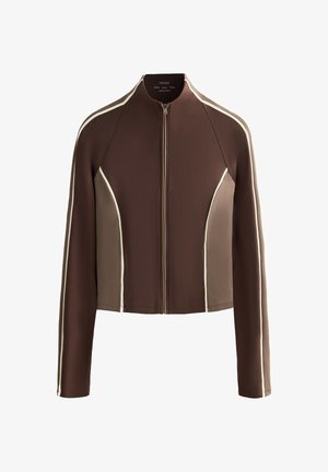 Brown athletic jacket with a zip front, long sleeves, and light beige side panels. Features contrasting stripes along the shoulders and zipper.