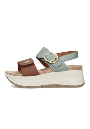 Sandalo con zeppa da donna con cinturino anteriore marrone, cinturino alla caviglia verde chiaro con doppia fibbia dorata, suola beige imbottita e suola esterna bianca con plateau.