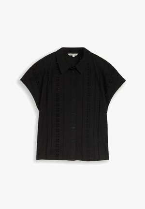 Chemisier noir à manches courtes avec boutons, bandes de dentelle à œillets verticales et col pointu, posé à plat sur un fond blanc.