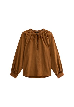 Blouse marron à manches longues avec un col froncé, un détail à nouer et des manches bouffantes. Fabriquée en tissu texturé avec une coupe décontractée.