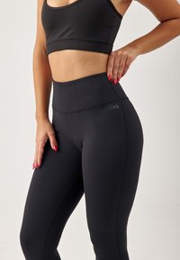 SNOCKS Tights - schwarz