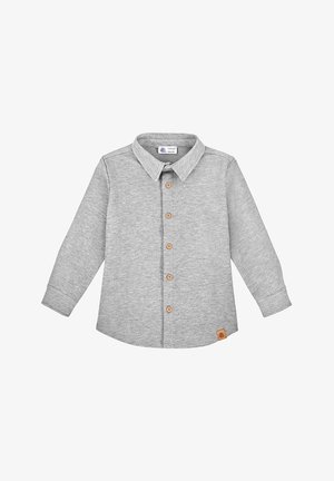 Szara koszula z długim rękawem wykonana z miękkiego materiału, z zapięciem na guziki z przodu, klasycznym kołnierzykiem, drewnianymi guzikami i małą naszywką z logo na dole.