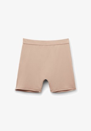 Shorts i en lys beige farve, lavet af ribbet stof. Har en glat talje og er klippet til midt på låret med en lige kant.