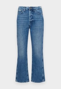 Farkut, joissa on levaanlahkeet, säännöllinen vyötärö, viisi taskua ja hienovarainen haalistuma. Kangas on keskipainoinen ja pehmeä. 