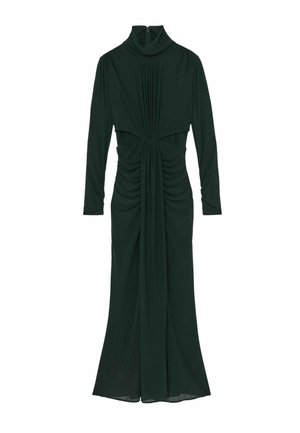 Tumši zaļa garām piedurknēm kleita ar augstu apkakli, izsistiem akcentiem jostasvietā un plūstošu svārku. Izgatavota no mīksta, teksturēta auduma.