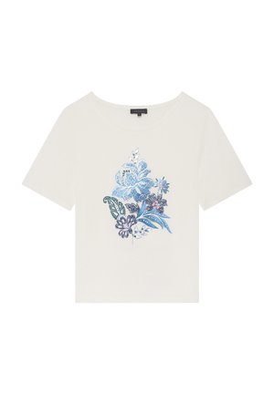 Camiseta de manga corta color crema con estampado gráfico de flores en azul y púrpura, cuello redondo y corte relajado. Material de algodón suave.