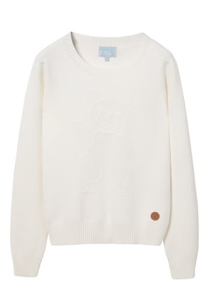 Fehér kötött pulóver, amelynek elején kiemelkedő mackó minta található. Bordás mandzsetták és hem; kör alakú barna logó folt az alsó oldalon.