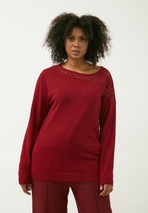 Burgunderfarbener Pullover mit langen Ärmeln, Spitze und verstreuten Pailletten am Halsauschnitt, mit geripptem Saum und lockerer Passform.