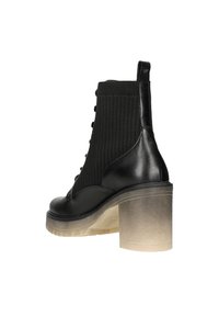 Wojas Botines con plataforma - black