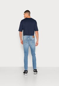 Lee MALONE - Calças de ganga de corte skinny - mid worn