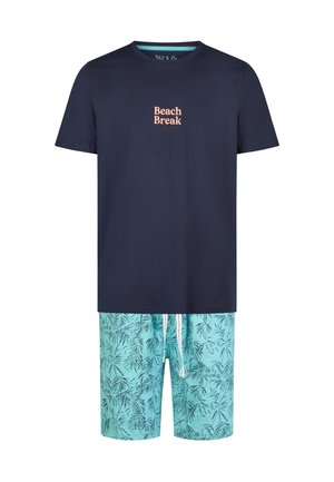 Navy blue T-shirt with "Beach Break" text paired with light blue swim shorts featuring dark palm leaf patterns and a white drawstring.