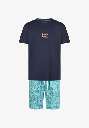 Navy blue T-shirt with "Beach Break" text paired with light blue swim shorts featuring dark palm leaf patterns and a white drawstring.