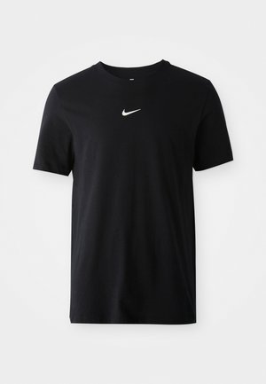 Black cotton t-shirt with short sleeves, round neckline, and a small white Nike logo on the chest. Smooth texture and classic fit.