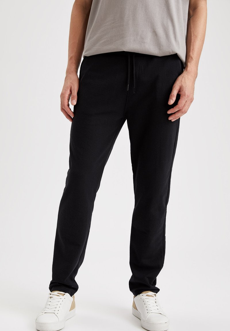 DeFacto SLIM FIT Tracksuit bottoms black Zalando.ie
