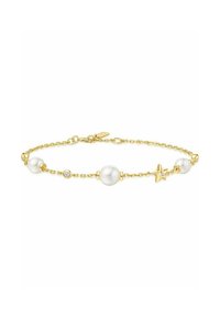 Zarte goldene Kettenarmband mit drei weißen Perlen, einem kleinen klaren Edelstein und einem goldenen Sternanhänger mit einem Edelstein in der Mitte.