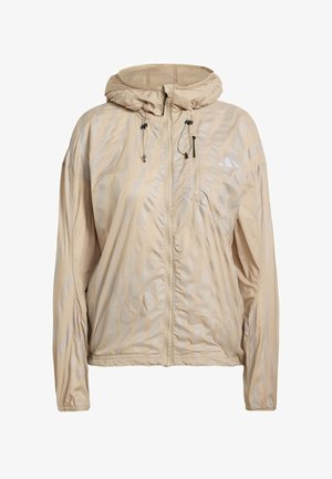 Lekka beżowa kurtka z kapturem, z zamkiem błyskawicznym z przodu i wzorem teksturowym. Zawiera regulowane sznurki i subtelny akcent logo.