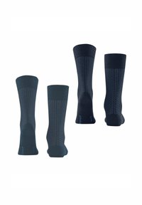 Dunkelblaue Socken mit strukturierten Mustern und gerippten Bündchen. Hergestellt aus einem Mischmaterial, mit dezentem Branding auf den Sohlen.