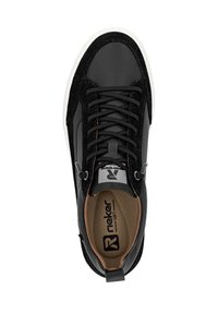 Black sneaker with textured leather and suede accents, round toe, lace-up design, and brown insole featuring logo. White rubber sole.